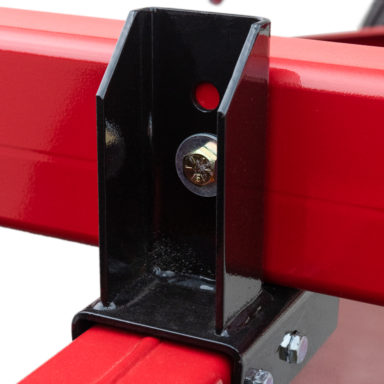 screwed shut cross member on bale carrier